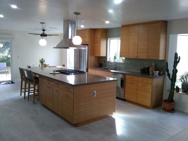 Siegrist kitchen:  DeWils  Taurus Horizontal door in Bamboo w/ Natural finish and Pental Stormy Sky 