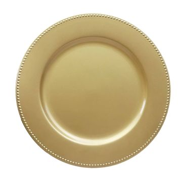 Decorative charger plate in the style solid gold with beaded edge.