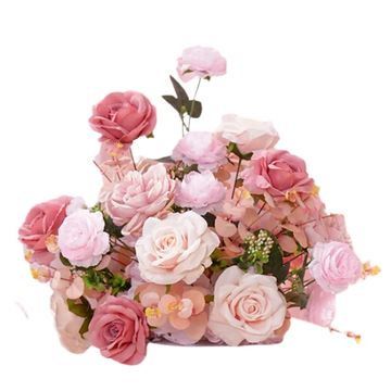 Artificial flower centerpiece in shades of pink. 