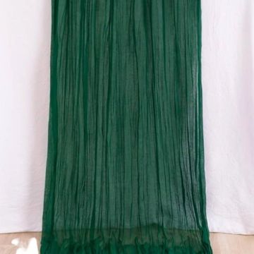 Emerald green table runner for wedding and event decor.
