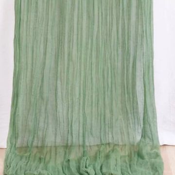 Sage green table runner for wedding and event decor.