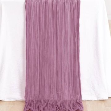 Purple table runner for wedding and event decor.
