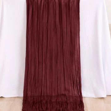 Burgundy table runner for wedding and event decor.