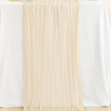 Beige table runner for wedding and event decor.