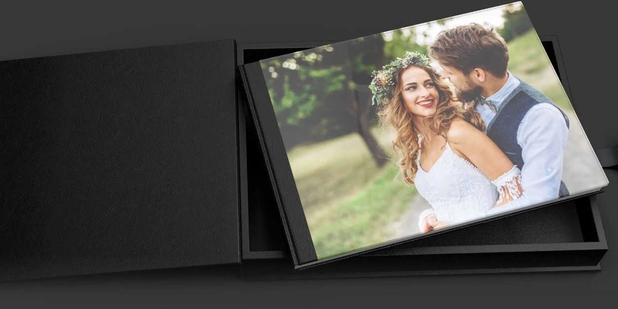 beautiful black photo album with acrylic and leather cover in its elegant leather box