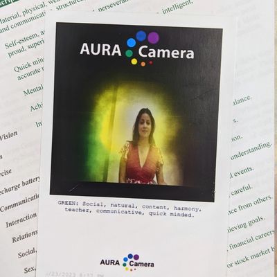 aura photo of a women with a green aura & a page in the background with information about her aura