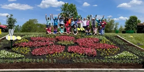 The Coxhall Guild and Master Gardeners planting the quilt garden