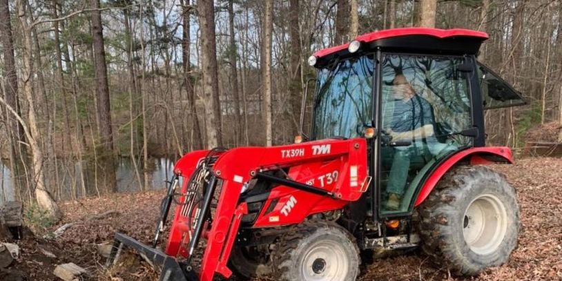 Cleaning debris and leaves prior to seeding pasture. 