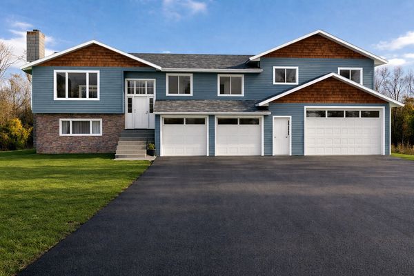 Home addition design for an existing 2,200 sq ft residence featuring a new legal suite above an over