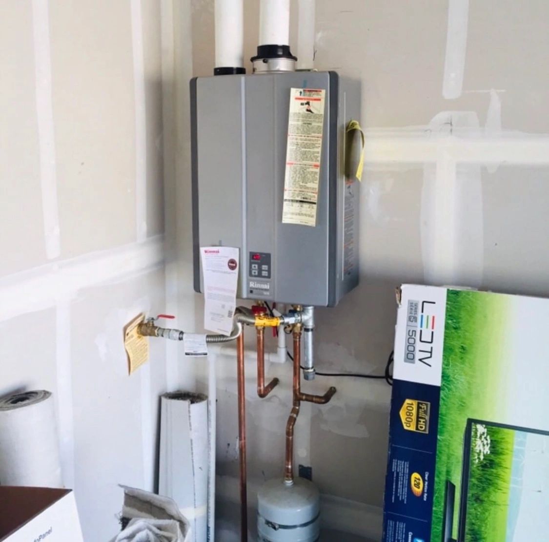 Navien tankless water heater installations and replacement by Area Plumbing Orange County, Ca
