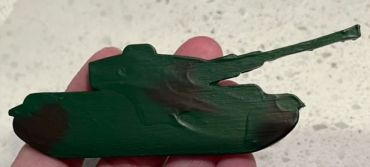 Army tank that is dark green and brown
