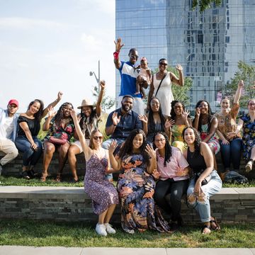 Family and friends celebrating an engagement in Philadelphia. Proposal photography Philly.