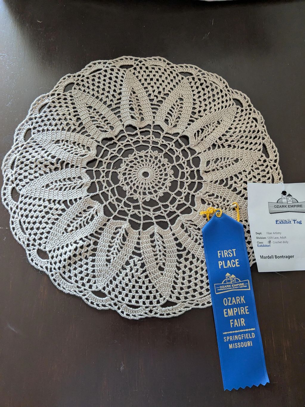 Circular lace crocheted by Mardell Bontrager with first place ribbon 