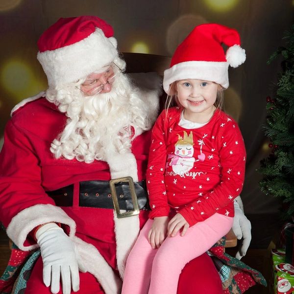 Santa and young girl. 