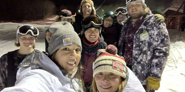 People standing at the top of Mt. Zion tubing hill