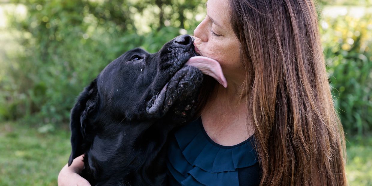 Owner of Paws & Pines Getaway Jen and her dog Shadow.