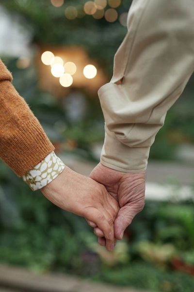 Couple holding hands