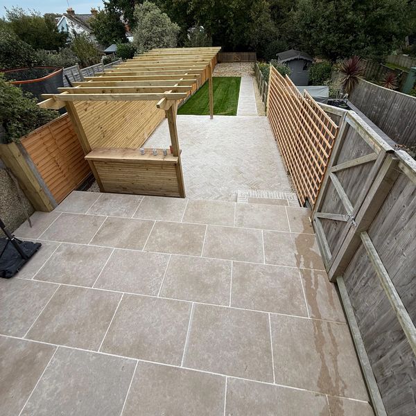 full garden transformation 
cowes
patio
landscaping
limestone paving slabs
Pergola Isle of Wight