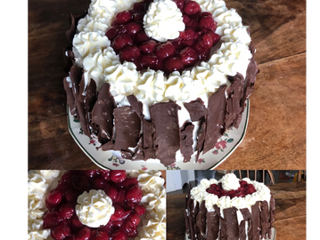 Specialty Black Forest Cake with sour cherry filling, fresh whipped cream and chocolate bark