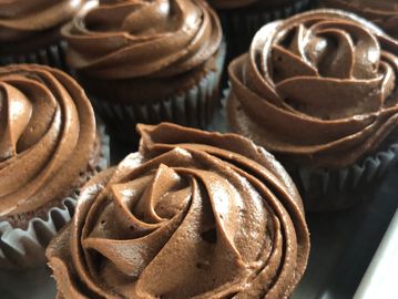 Chocolate cupcakes with chocolate swiss meringue buttercream frosting