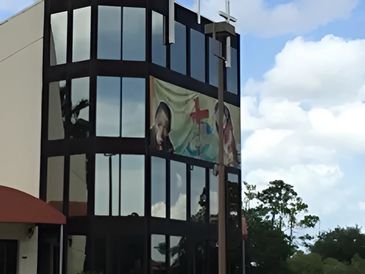 A poster is attached to a building