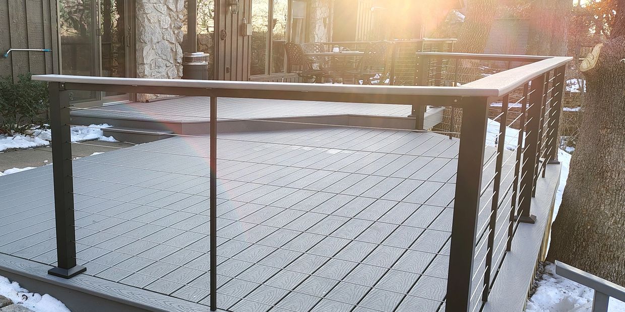 Trex Composite Deck with black aluminum cable railing. 