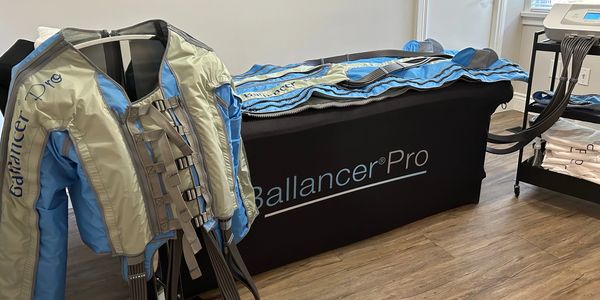 Ballancer Pro compression therapy equipment in a room.