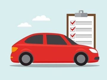 Red car with a checklist in the background.