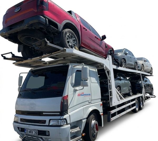 A car transporter truck carrying multiple cars on two levels.