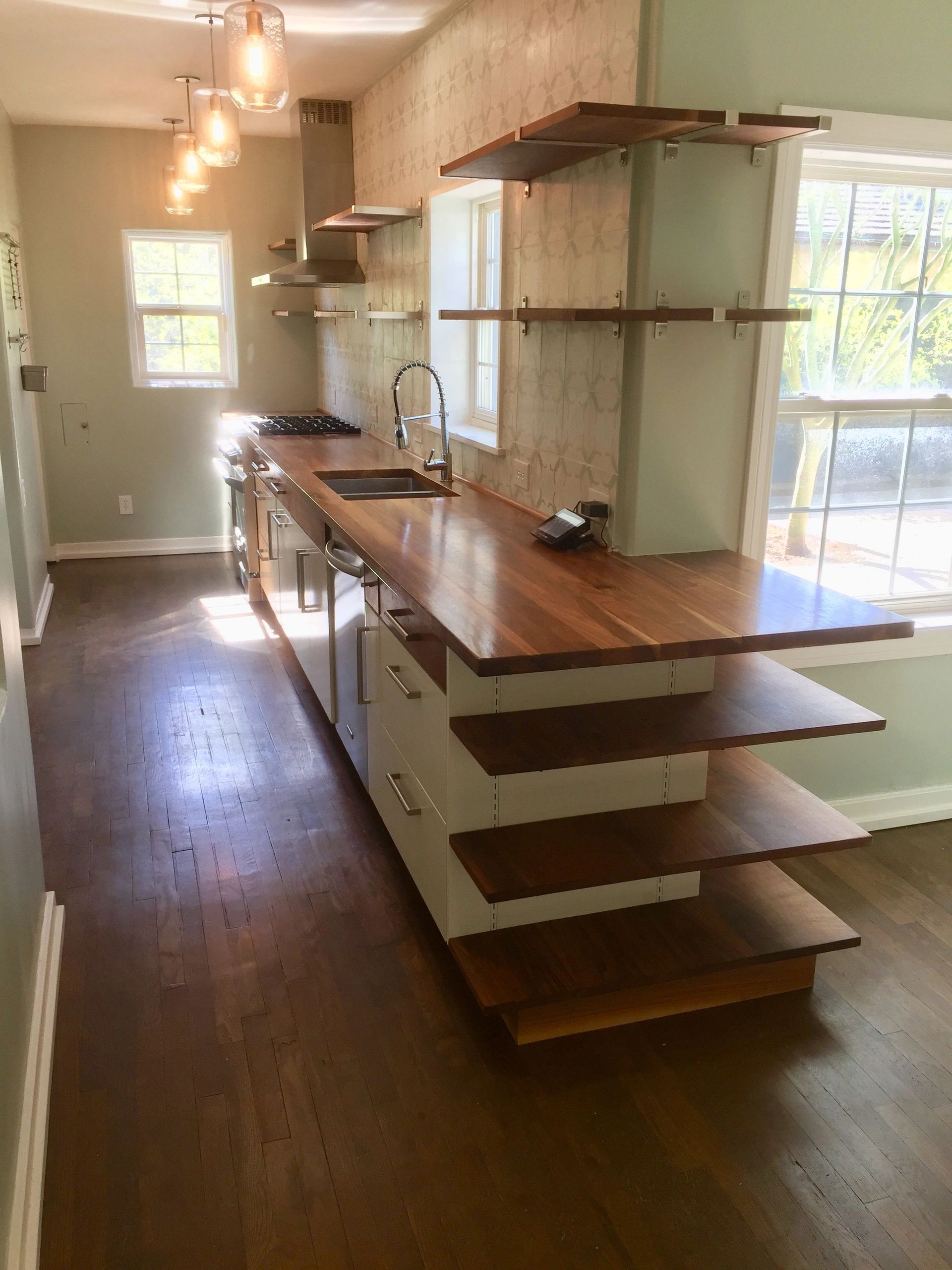 White lacquered cabinets with solid walnut shelves and countertop. 1930's Phoenix house galley kitch