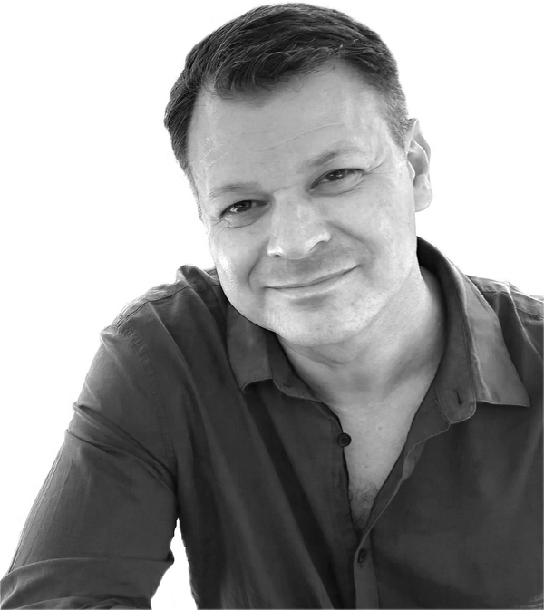 Black and white headshot of Erik Meiselman.