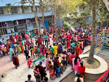 A crowded outdoor gathering with many people.