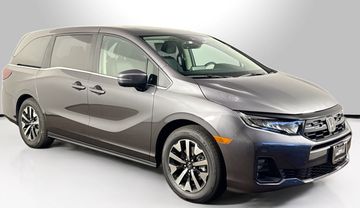 Large 7-passenger taxi van for Navy PIR graduation groups traveling to O'Hare and Midway Airport.