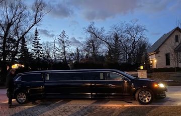Black stretch limousine service for 10 passengers to O'Hare or Midway Airport.