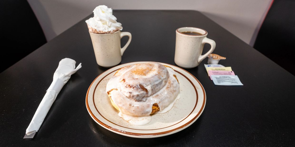 Cinnamon Roll with a cup of coffee 