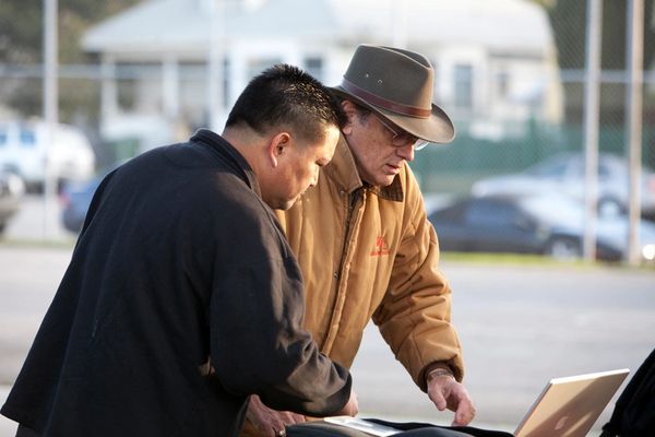 Line Producer Rick Buhay discussing production schedule with John.