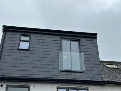 Loft conversion dormer exterior in Ealing by LoftSpec