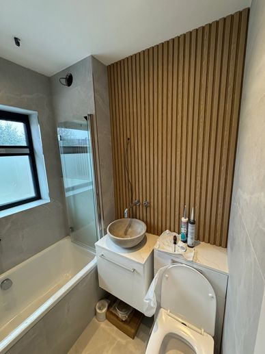 Modern bathroom renovation in Ealing, West London by LoftSpec