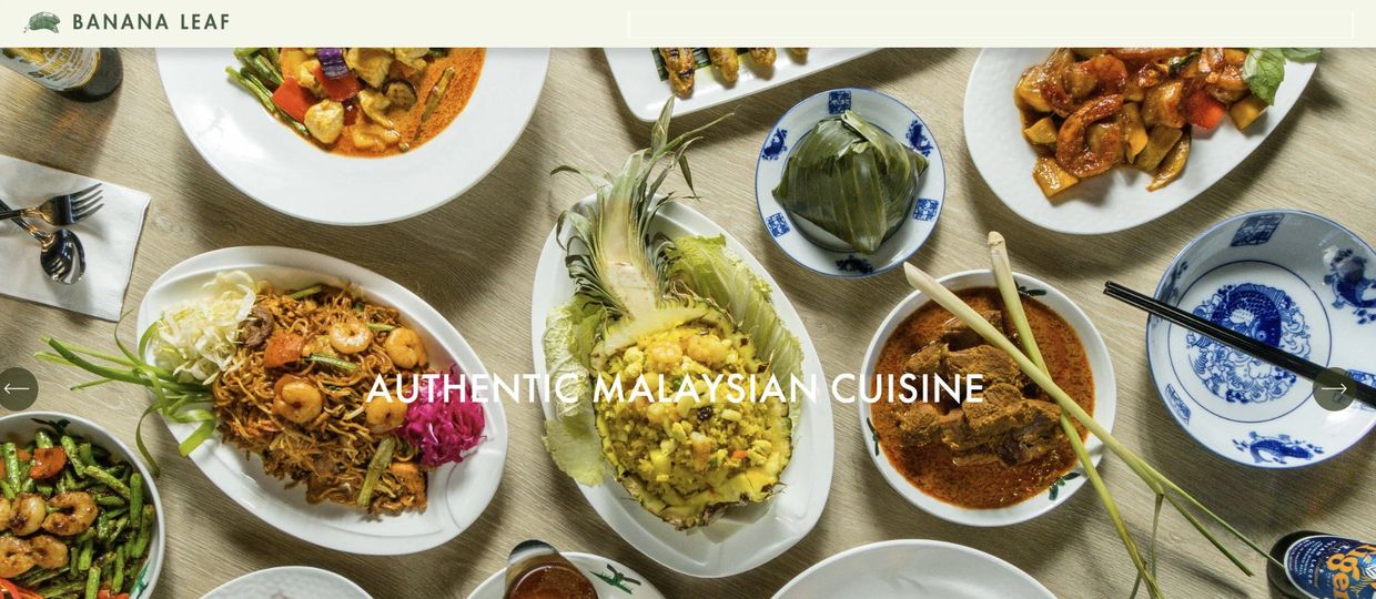 A spread of authentic Malaysian dishes at Banana Leaf restaurant.