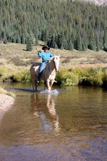 Horseback fly fishing