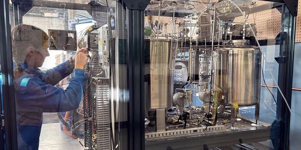 a person repairing an equipment 