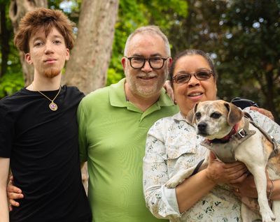 Patrick McLean with wife Angela Scott, son Ian, and dog Charlotte