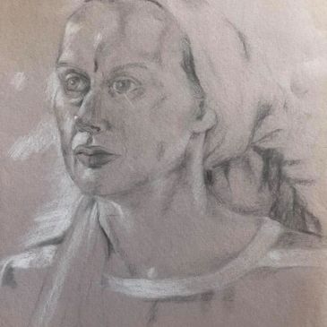 Charcoal and conte portrait of a middle aged woman - head and shoulders.
