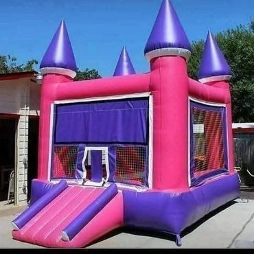 15×15 Pink, Purple and White Princess Castle inflatable.