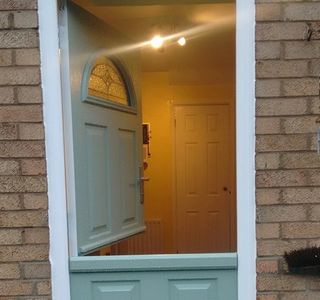 Chartwell Green Solid Core Stable door with Zinc Art Elegance glass installed in Pleasley Mansfield