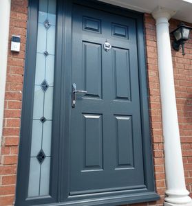 Solid Core composite front door with a full height side panel installed by our Mansfield fitters.