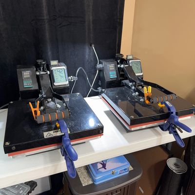 two press machines on a table