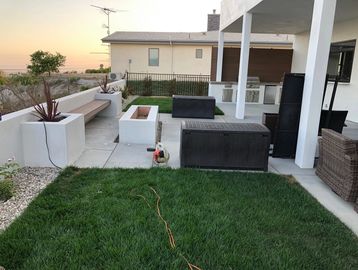 The "Rustic Elegance" BBQ Patio Oasis embodies a seamless blend of functionality and aesthetics. It 