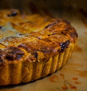 side view of cherry pie with lattice crust