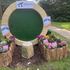 Life size Hobbit Door 2m and small garden at Bloom featuring fairy houses